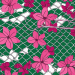 A broken chain link fence being mended with colorful flowers and vines